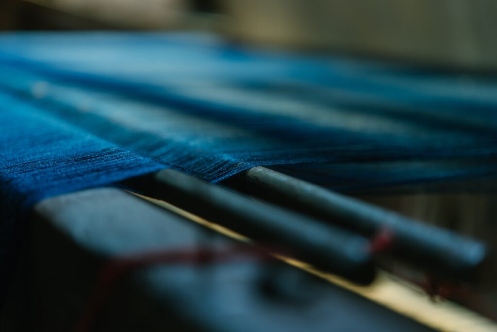 tradition to modern Blue threads in a handloom